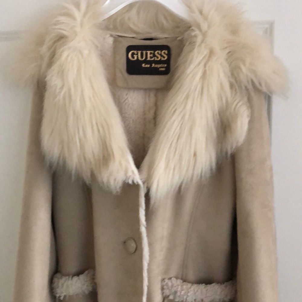 Warm coat with fur trim
